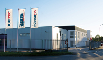 Jung Gummitechnik administration building with flags at Einhausen